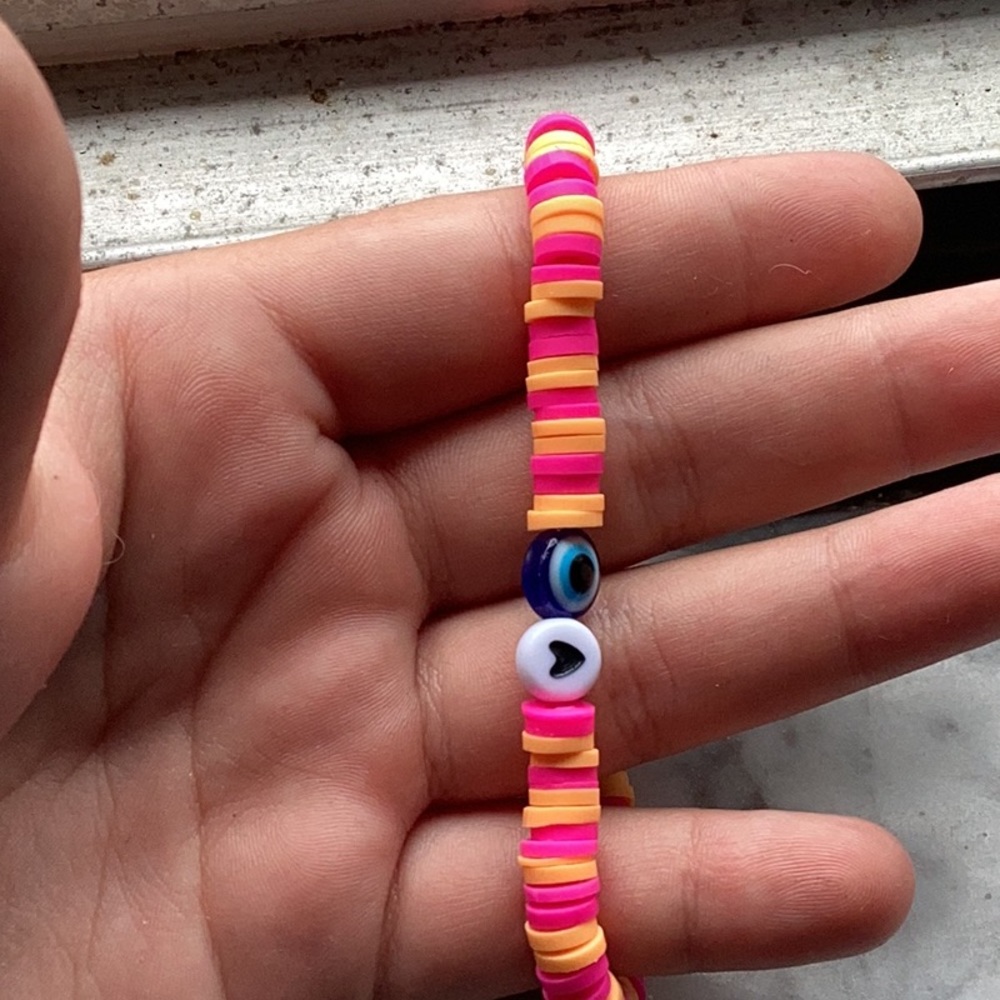 Hot pink/orange evile eye hart bracelets